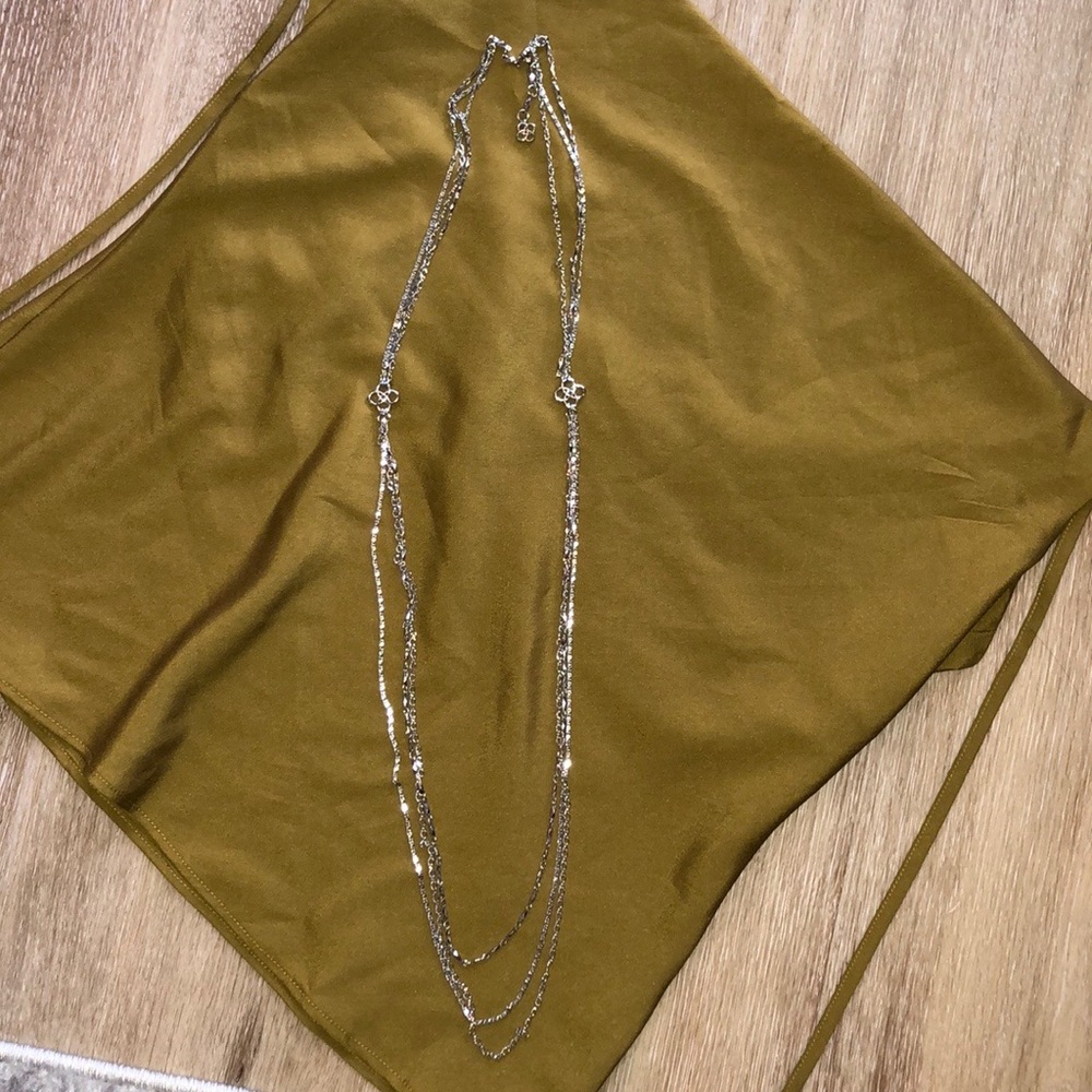 Layered silver necklace.